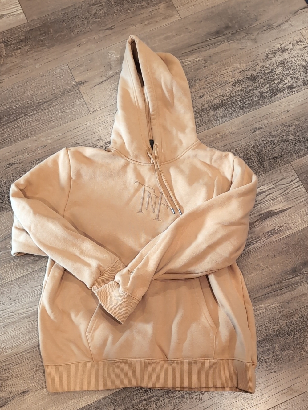The North Face tan/beige pullover hoodie with logo tag
